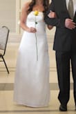 I am 5'7 and wore 3-inch heels and didn't need to get any length off the bottom. I did get it taken in a little bit in that waist. If you are in between xs and s I would definitely go with the xs. - Gracie E.