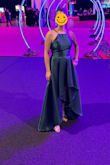 I purchased this dress for a charitable gala. I ordered 9 different dresses to try, and this one was the winner! It's very different from what I would normally wear, but as soon as I tried it on, I was in love. I ordered a small and medium and went with the medium. The small was too tight in the bust and waist. I'm not overly busty but carry weight in my middle. There is no stretch whatsoever to the material. The material is thick and looks high quality. I did not need a bra which was a bonus. The fit of the top kept the girls in place. I've had three kids so they need support. I've never received so many compliments on a dress! - Elizabeth K.