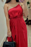Wore it for the holidays. Love it. The red is beautiful. It's not too tight around the mid-section. - Lily D.