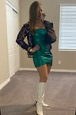 I bought this for a Mardi Gras party. The fit was perfect. My only complaint is the hem in the front. It's very short. - Becky K.