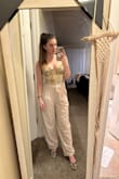 I've never had a problem with anything from Lulu's but these pants were supposed to be ivory and they came more beige. They're darker than anticipated and they don't match what I was hoping to pair them with, and they're too long and too loose fitting in the legs (they're meant to be a little loose, but not baggy), so, unfortunately, they're going back. (This is me posing. The way they look while walking around is not as flattering) - Morgan S.