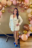 I wore this for my bridal shower. I usually wear a size 10 in pants/dresses and this fit perfectly. I bought one of those lace bandeau tops on Amazon because this romper has a very low cut neckline, which may be fine for bigger chests. I got so many compliments and was comfortable in it. The zipper is in the front so you can zip it up yourself without issues. Only issue is the sleeves are a bit long, but that's such an easy fix. I highly recommend this outfit. - Kara F.