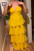 The straps aren't really adjustable, but you can tie the back tighter to make the front tighter. It's definitely see-through (as you can tell in my photo) so I will wear sticky boob covers underneath. Love the material and how bright it is! - Kaitlyn F.