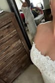 I loved this dress, but decided I wanted to go with something a little more fancy, but this dress fit great! It was simple yet so beautiful! I love the lace. If I was having a beach wedding or something a bit less formal, I definitely would have kept it. The price was unbeatable! - Natalie Z.