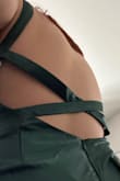 It's a really pretty dress that fits well on and is tight on the waist. The back of the dress, as in the straps, did not fit as well as it could have. It didn't tighten around my body. Speaking of the straps, everything else looked good. - Noemi D.