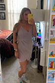 I wore this dress for a night out to celebrate my birthday. The fit was good, but I wore Spanx underneath. If you are a girl who needs a little compression, this dress will not offer any. It is form-fitting. However, for the price, it worked just fine for what I needed. - AnaClare B.