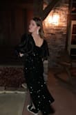 The dress was true to size and a gorgeous color! It was also much softer than I expected, especially considering the sequins. I decided to add some silk sleeves to it, and that was such an easy change to make! Lovely length, and I'm pretty tall (5'9"). - Ella Z.