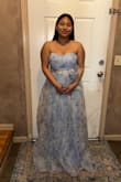 Fit me great just a bit tight around the arms and breast area. The fabric needs some TLC and the length was a tad long for me. - Leslie C.