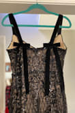 The dress fits lovely and I felt very pretty. I did add velvet straps with bows in the back. The straps very flimsy - not a lot of support for someone with a chest. - Jennifer D.