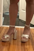 They are comfy so far (just walking around my house doing chores) and are really pretty ivory satin. The platform means the heel height isn't that bad. And I usually find shoes too wide at the toe box but these are wide enough for me. I can't wait to wear these for my wedding day! - Min C.