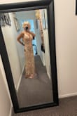 I opened the package and opened the zipper to try on and it broke off right away. And was way too long. But I did love the dress itself!! - Annetta D.