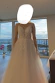 Ended up going with this dress for my wedding after trying on a ton at different stores.  I originally thought I wanted a strapless mermaid dress and after trying on a few, quickly realized that A-line dresses are the way to go. The dress is high quality, beautiful, and most importantly, super comfortable.  I can easily see myself dancing and having a blast in this dress without worrying or having to adjust myself constantly. - Jen K.