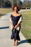 The dress fit great. I've never ordered from here before, but I'm very pleased. I have to find somewhere to wear. - India S.