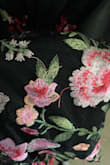 Don't get me wrong. It's a beautiful dress. But the top of the dress has different embroidery than what is currently pictured. And there are multiple areas of frayed strings all around the dress. It fits my middle area but is a little large at the top, so I'll have to bring it in to get it adjusted at the straps area to fit me better. Hope this can be fixed - Sandra Y.