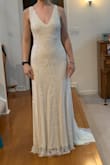 This dress is gorgeous and looks much more expensive than it is. I didn't end up choosing it for my wedding dress because it's fairly heavy with the beads for my outdoor Florida wedding and because I wanted it to be a bit more fitted in the hips. But it was a top contender! - Annika G.