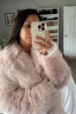I got a small because extra small was not available, and the coat fits well. I really love that it's very very lightweight and not as heavy as most coats. The material is soft and plushy. Also, the color is amazing! Will be wearing it during my Japan trip :) - Lily V.