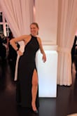 I had the dress taken up at the neck to make the bust area a better fit (like 1/4") and it was perfect with a backless bra.  The small was very fitted through the waist but still able to dance all night! Wore a 3" heel which helped and made the length perfect for me (almost 5'8"). - Laura M.