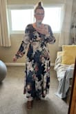 I love the pattern, material, and length of this dress. I just wish (like many wrap dresses) it had more coverage at the bust. I didn't need a bigger size for the skirt portion, but I need a cami underneath if I dont want to feel overexposed. I couldn't size up as XL was the largest size available. But I still love it and think it's going to be quite versatile. - Kate A.