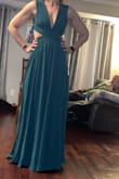 Took a chance on ordering this for my daughter's wedding.  I took others advice and ordered a size up. I normally wear a medium, the Large fits and is a little loose. - Chantelle R.