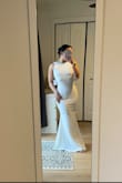 I took a chance with this dress and ended up loving it so much more than I thought I would! It fits like a glove; the open back is so flattering, and the fabric hugs you in. I wish my pearl studded veil was here to give the full effect, but here is a poor quality iPhone picture for the time being. - Alisha B.