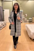 I've received lots of compliments when wearing this. Paired with my snakeskin boots or my Chelsea boots - makes me feel hip and chic at 62 but most importantly...comfortable - Michele W.
