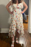 This dress is super flattering! It compliments my chest and waist while covering my stomach area. The cleavage part of the dress has a structure in it to support the girlies which we love. Still planning to wear a bra with it and will use fashion tape to hire my bra straps under the dress ties. - Jordan C.