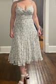 Cute, just didn't love it on me. It could use a bit more chest coverage. - Jordan C.