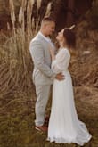 The quality of this dress is amazing. Life threw me and my now husband a LOT of curveballs over the years, and we had to postpone our "big" wedding twice. We decided to elope on our 5 year anniversary, and this dress was PERFECT! - Michelle M.