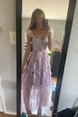 I decided to write a review after seeing a 1-star review from another shopper. I'm honestly in love with this dress, I feel amazing in it and I'm obsessed with the gentle floral design and ruffles. I think it's a pretty good quality as well. The only problem, it might be a little big on you if you have a smaller bra cup. I'm between 32a and 32b and there is some room left, but nothing critical. I would like to try an Xs, but it's never in stock, so I just kept the small. :) - Anna T.