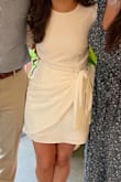 Ordered this for a cooler weather wedding shower and it was perfect! The small was slightly snug on my bum (size 6), but fit perfectly up top. Very classy, and got so many compliments! - Rita P.