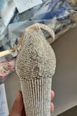 These shoes looked so cute online, but when I got them in real life, the diamonds were all messed up, and some were even missing the diamonds. The shoes were also sticky from the adhesion of whatever was used to stick the diamonds on. Will be returning. - Andra K.