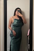 This is a lovely dress! I love the silk, rose pattern. In my opinion, it's a bit long for a midi dress and the side boob area is a bit loose. - Areli C.