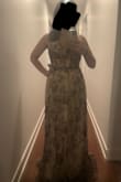 This dress is GORGEOUS. Unfortunately, my boobs are too big and I'm not the type to flaunt so much. To make it work I would have to heavily alter it to support my boobs, take it in, in the back, and alter the height of course. I put it runs large because you can adjust the back of it. Really sad it didn't work out. - Stephanie A.