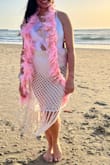 This coverup is more beige not truly white but it went super well with my swimsuit! I wore it for my bachelorette and it's stunning. You will not regret purchasing this! - Liliana R.