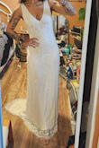 I absolutely am in love with this dress. It's everything I wanted and more. So well made, so beautiful. Perfect for a beach elopement/ wedding day. It fits well, is crafted beautifully and is of great quality. I cannot wait to wear it on my wedding day. I am in love. It fits just slightly big, but I'm not sure an xs would have fit as nicely. Overall, I'm very happy with my order. - Brittany V.