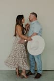 Absolutely love this dress! I wore it for our family pictures. Despite me still gaveling some baby weight on it was perfect. I love how I can't tighten the Top with it and it does not feel loose because I have a smaller chest. The hip area is flowy perfect for my bigger bottom half. - Carolina V.