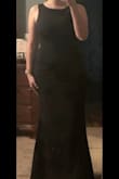 Very good quality. Thick material. Very flattering. Covers back rolls. - Meadow M.