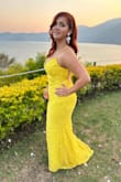 The dress is true to size. The inside lining is very comfortable. - Kristal A.