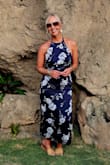 I absolutely love this dress. The back is open and sexy, and it is comfortable to move around in. It would be great as a wedding guest dress or for any other special event. I am so happy with my purchase. I wear between a small and a medium, and because this dress is more fitted, the medium was a perfect fit. - Tammy H.