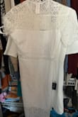 Dress did not fit could not get over my button stretch I will keep the other dress I purchased. - Kyra C.