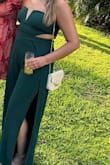 I wore this to a wedding and had the best time dancing in this jumpsuit all night. Lately I have been having to buy size large and was nervous about the medium sized jumpsuit, but it fit so well. I think a large would have been too big for me especially because of my smaller bust size. It's simple enough but has the fun cutouts and the large leg slits which I love because it almost looks like a dress at times. I felt so comfortable in this jumpsuit and would recommend!! - Lindsay P.