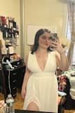 First of all, it is such a mesmerizing dress, and when I received it in the package I didn't even expect for it to arrive with a dress holder rack. Such a pleasant bonus! 

This dress fitting is perfect, I felt like Athena for a second. I did get mine tailored to my height as long dresses are a no-no for me lol. 
Definitely recommend, I just wish they had the royal blue and fire red back in stock in my size, I will order again. - Nueda M.