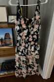 This dress is simply dreamy! It's classy but the flowers add an ethereal touch that makes it feel like you are wearing a garden. It fits true to size. I love that I can wear it with just a strapless bra and not have to worry about shapewear or special undergarments with it. 
Love it! - Kristi G.