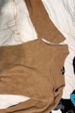 Cute but the sleeve came right off after the first wash. Very unfortunate because the fabric is super soft and was the perfect length for high waisted jeans - Cassidy C.