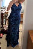 I love the color!! There is no padding in the top which is a bit disappointing but otherwise, it's a fabulous dress!! Was a bit long for me (I'm only 5.2), but worked well with 3 inch heels - Kylyn L.