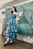 I got this dress to wear to my fairy themed party and it was beautiful! I bought it in a size medium because it was the only size left and then got it taken in a bit and it fit perfectly! Definitely a true medium. Flowy, fun, and whimsical and didn't need any ironing or steaming. Always a fan of my Lulus purchases but this one was an extra winner. - Rebecca G.