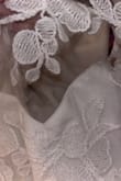 The mesh neckline was ripped before I could even use it. Didn't realize it until after I cut off the tag - Celine D.
