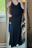 The dress arrived super quick, was easy to put on without assistance, and really flatters me in the right places. I've never worn dresses that are form-fitting / ''body-con'' but this dress literally opened up a whole new world and I LOVE how it looks! - Lilly I.