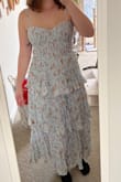 This dress is great, I appreciated the built-in padding so you wouldn't have to wear a bra. The corset top was super flattering and I loved the floral pattern and ruffles. I got this as an option for my best friend's spring engagement party. - Jacki B.