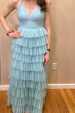 This dress fits perfectly and does not need a bra! It's very comfortable and also stylish, great for a lot of different occasions. - Megan D.